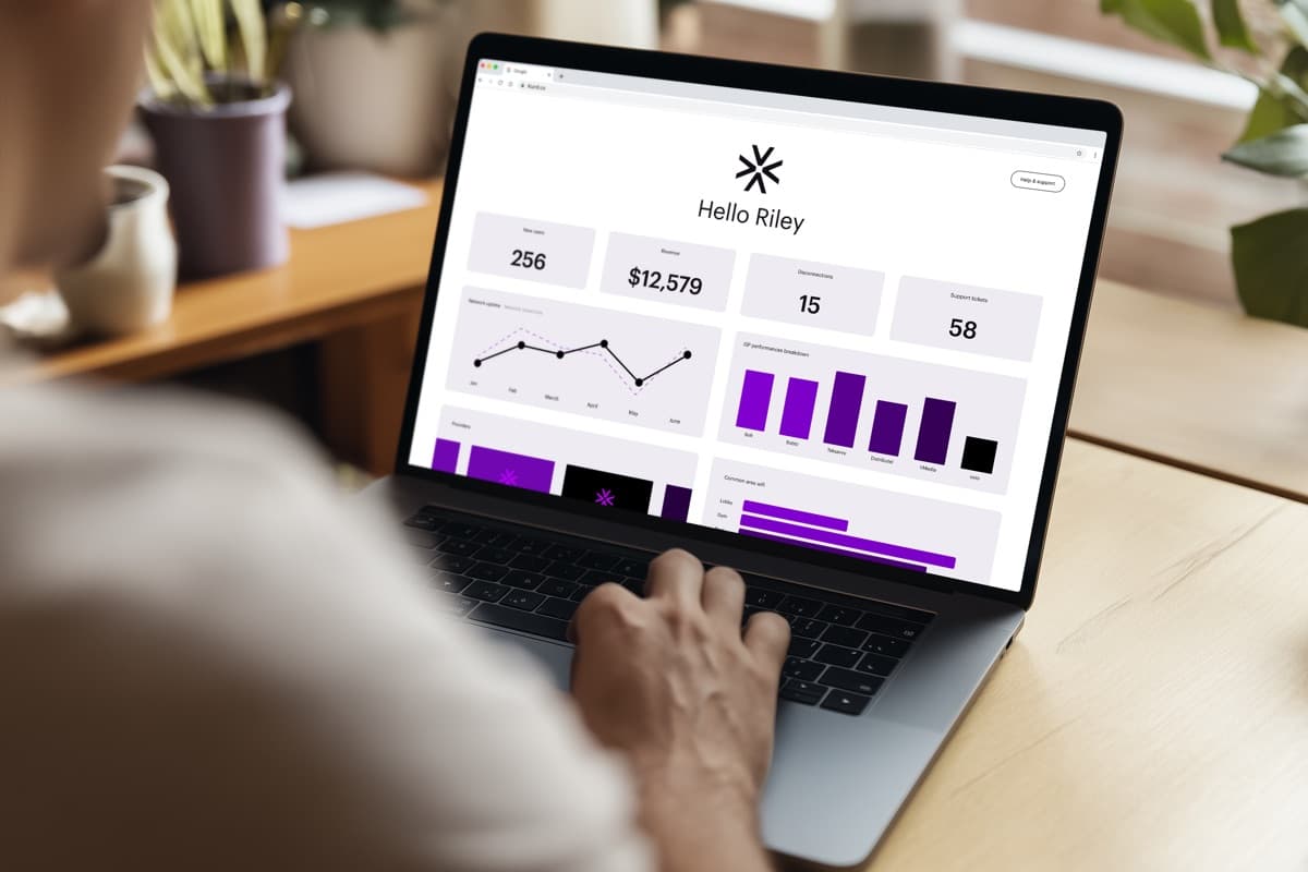A building owner viewing the Kurnl revenue dashboard on a laptop